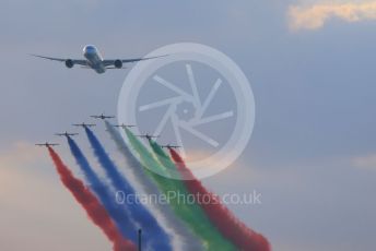 World © Octane Photographic Ltd. Formula 1 – Etihad F1 Grand Prix Abu Dhabi. A6-BMH Etihad Boeing 787-10 Dreamliner in their "Greenliner" livery in formation with the 7 Al Fursan Aermacchi MB-339As overfly the grid.