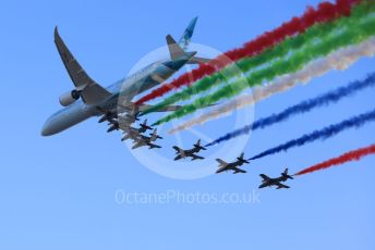 World © Octane Photographic Ltd. Formula 1 – Etihad F1 Grand Prix Abu Dhabi. A6-BMH Etihad Boeing 787-10 Dreamliner in their "Greenliner" livery in formation with the 7 Al Fursan Aermacchi MB-339As overfly the grid.