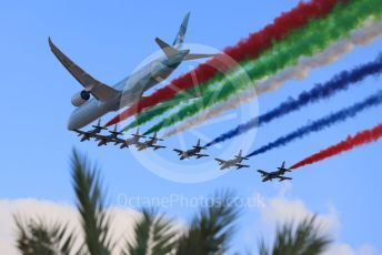 World © Octane Photographic Ltd. Formula 1 – Etihad F1 Grand Prix Abu Dhabi. A6-BMH Etihad Boeing 787-10 Dreamliner in their "Greenliner" livery in formation with the 7 Al Fursan Aermacchi MB-339As overfly the grid.