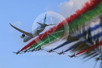 World © Octane Photographic Ltd. Formula 1 – Etihad F1 Grand Prix Abu Dhabi. A6-BMH Etihad Boeing 787-10 Dreamliner in their "Greenliner" livery in formation with the 7 Al Fursan Aermacchi MB-339As overfly the grid.