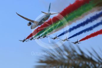 World © Octane Photographic Ltd. Formula 1 – Etihad F1 Grand Prix Abu Dhabi. A6-BMH Etihad Boeing 787-10 Dreamliner in their "Greenliner" livery in formation with the 7 Al Fursan Aermacchi MB-339As overfly the grid.