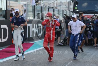 World © Octane Photographic Ltd. Formula 1 – Etihad F1 Grand Prix Abu Dhabi. Williams Racing FW43B – Nicholas Latifi, Scuderia Ferrari Mission Winnow SF21 – Charles Leclerc and Mercedes AMG Petronas F1 Team F1 W12 - Valtteri Bottas. Yas Marina Circuit, Abu Dhabi. Sunday 12th December 2021 Drivers’ Parade.