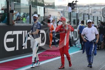 World © Octane Photographic Ltd. Formula 1 – Etihad F1 Grand Prix Abu Dhabi. Williams Racing FW43B – Nicholas Latifi, Scuderia Ferrari Mission Winnow SF21 – Charles Leclerc and Mercedes AMG Petronas F1 Team F1 W12 - Valtteri Bottas. Yas Marina Circuit, Abu Dhabi. Sunday 12th December 2021 Drivers’ Parade.