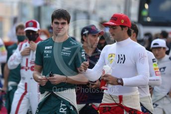 World © Octane Photographic Ltd. Formula 1 – Etihad F1 Grand Prix Abu Dhabi. Aston Martin Cognizant F1 Team AMR21– Lance Stroll and Scuderia Ferrari Mission Winnow SF21 – Carlos Sainz. Yas Marina Circuit, Abu Dhabi. Sunday 12th December 2021 Drivers’ Parade.