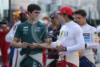 World © Octane Photographic Ltd. Formula 1 – Etihad F1 Grand Prix Abu Dhabi. Aston Martin Cognizant F1 Team AMR21– Lance Stroll and Scuderia Ferrari Mission Winnow SF21 – Carlos Sainz. Yas Marina Circuit, Abu Dhabi. Sunday 12th December 2021 Drivers’ Parade.