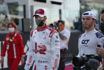 World © Octane Photographic Ltd. Formula 1 – Etihad F1 Grand Prix Abu Dhabi. Alfa Romeo Racing Orlen C41 – Antonio Giovinazzi and Scuderia AlphaTauri Honda AT02 – Pierre Gasly. Yas Marina Circuit, Abu Dhabi. Sunday 12th December 2021 Drivers’ Parade.