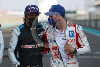 World © Octane Photographic Ltd. Formula 1 – Etihad F1 Grand Prix Abu Dhabi. Alpine F1 Team A521 – Fernando Alonso and Uralkali Haas F1 Team VF21 – Mick Schumacher. Yas Marina Circuit, Abu Dhabi. Sunday 12th December 2021 Drivers’ Parade.