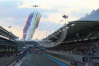 World © Octane Photographic Ltd. Formula 1 – Etihad F1 Grand Prix Abu Dhabi. A6-BMH Etihad Boeing 787-10 Dreamliner in their "Greenliner" livery in formation with the 7 Al Fursan Aermacchi MB-339As overfly the grid.