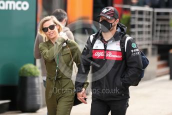 World © Octane Photographic Ltd. Formula 1 – Emilia Romagna Grand Prix – Imola, Italy. Sunday 24th April 2022 Paddock. Alfa Romeo F1 Team Orlen C42 - Valtteri Bottas and girlfriend Olympic cyclist Tiffany Cromwell.