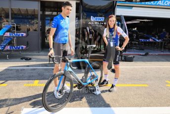 World © Octane Photographic Ltd. Formula 1 – French Grand Prix - Paul Ricard - Le Castellet. Thursday 21st July 2022 Paddock. BWT Alpine F1 Team A522 - Esteban Ocon and Team FDJ cyclist Évita Muzic.