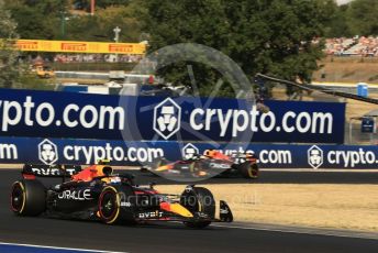 World © Octane Photographic Ltd. Formula 1 – Formula 1 – Hungarian Grand Prix - Hungaroring, Hungary. Friday 29th July 2022 Practice 2. Oracle Red Bull Racing RB18 – Sergio Perez and Max Verstappen.