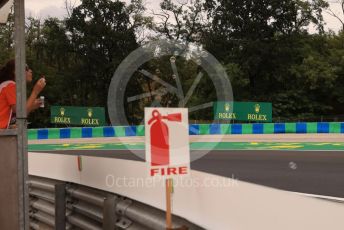 World © Octane Photographic Ltd. Formula 1 – Formula 1 – Hungarian Grand Prix - Hungaroring, Hungary. Saturday 30th July 2022 Qualifying. A marshal relaxing prior to qualifying.
