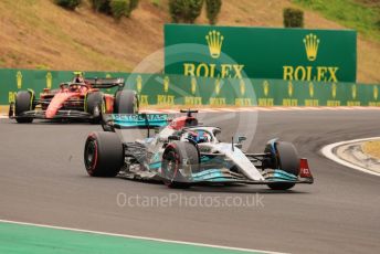 World © Octane Photographic Ltd. Formula 1– Hungarian Grand Prix - Hungaroring, Hungary. Sunday 31st July 2022 Race Green Flag lap. Mercedes-AMG Petronas F1 Team F1 W13 - George Russell and Scuderia Ferrari F1-75 - Carlos Sainz.