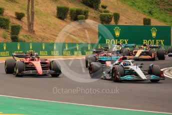 World © Octane Photographic Ltd. Formula 1– Hungarian Grand Prix - Hungaroring, Hungary. Sunday 31st July 2022 Race Green Flag lap. Mercedes-AMG Petronas F1 Team F1 W13 - George Russell leads Scuderia Ferrari F1-75 - Carlos Sainz and Charles Leclerc.