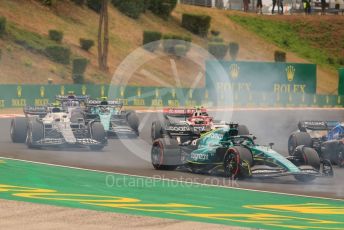 World © Octane Photographic Ltd. Formula 1– Hungarian Grand Prix - Hungaroring, Hungary. Sunday 31st July 2022 Race. Aston Martin Aramco Cognizant F1 Team AMR22 - Lance Stroll an d Scuderia AlphaTauri AT03 - Yuki Tsunoda.
