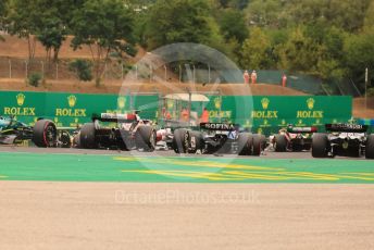 World © Octane Photographic Ltd. Formula 1– Hungarian Grand Prix - Hungaroring, Hungary. Sunday 31st July 2022 Race. Debris follows the pack into Turn 2 from collisions.