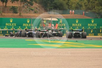 World © Octane Photographic Ltd. Formula 1– Hungarian Grand Prix - Hungaroring, Hungary. Sunday 31st July 2022 Race. Debris follows the pack into Turn 2 from collisions.