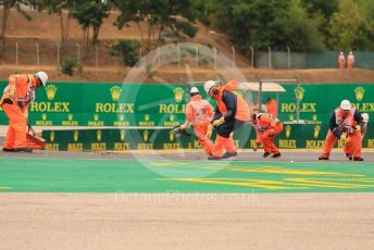 World © Octane Photographic Ltd. Formula 1– Hungarian Grand Prix - Hungaroring, Hungary. Sunday 31st July 2022 Race. Marshals clearing the debris at turn 2 under VSC.