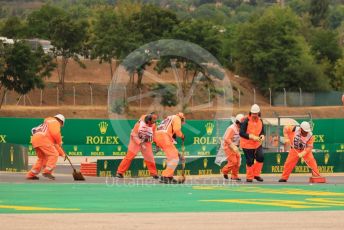 World © Octane Photographic Ltd. Formula 1– Hungarian Grand Prix - Hungaroring, Hungary. Sunday 31st July 2022 Race. Marshals clearing the debris at turn 2 under VSC.