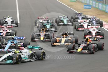 World © Octane Photographic Ltd. Formula 1– Hungarian Grand Prix - Hungaroring, Hungary. Sunday 31st July 2022 Race. Mercedes-AMG Petronas F1 Team F1 W13 - Lewis Hamilton and Oracle Red Bull Racing RB18 – Sergio Perez.
