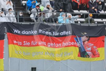 World © Octane Photographic Ltd. Formula 1 – Japanese Grand Prix - Suzuka Circuit, Japan. Friday 7th October 2022. Practice 2. Fan banner - Sebastian Vettel.