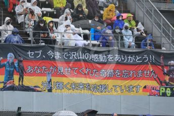 World © Octane Photographic Ltd. Formula 1 – Japanese Grand Prix - Suzuka Circuit, Japan. Friday 7th October 2022. Practice 2. Fan banner - Sebastian Vettel.