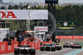 World © Octane Photographic Ltd. Formula 1 – Japanese Grand Prix - Suzuka Circuit, Japan. Saturday 8th October 2022. Practice 3. Busy start to practice 3, queue at the end of the pit lane
