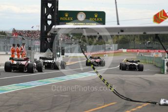 World © Octane Photographic Ltd. Formula 1 – Japanese Grand Prix - Suzuka Circuit, Japan. Saturday 8th October 2022. Practice 3. Busy start to practice 3, queue at the end of the pit lane
