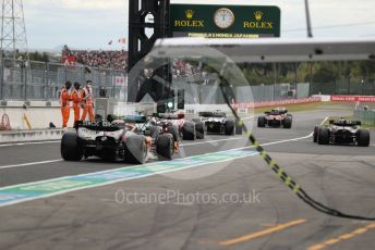 World © Octane Photographic Ltd. Formula 1 – Japanese Grand Prix - Suzuka Circuit, Japan. Saturday 8th October 2022. Practice 3. Busy start to practice 3, queue at the end of the pit lane