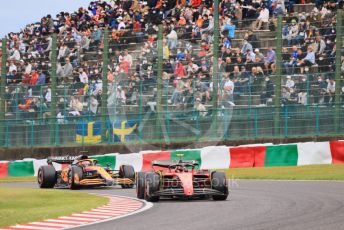 World © Octane Photographic Ltd. Formula 1 – Japanese Grand Prix - Suzuka Circuit, Japan. Saturday 8th October 2022. Qualifying. Scuderia Ferrari F1-75 - Carlos Sainz and McLaren F1 Team MCL36 - Daniel Ricciardo.