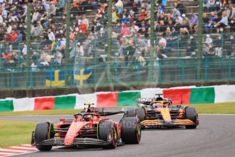 World © Octane Photographic Ltd. Formula 1 – Japanese Grand Prix - Suzuka Circuit, Japan. Saturday 8th October 2022. Qualifying. Scuderia Ferrari F1-75 - Carlos Sainz and McLaren F1 Team MCL36 - Daniel Ricciardo.