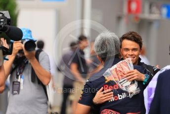 World © Octane Photographic Ltd. Formula 1 – Japanese Grand Prix - Suzuka Circuit, Japan. Saturday 1st October 2022. Practice 3. Red Bull Racing consultant - Masashi Yamamoto hugs Mercedes-AMG Petronas F1 Team F1 W13 Reserve driver – Nyck de Vries