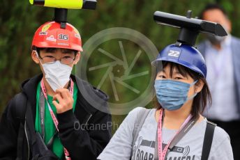 World © Octane Photographic Ltd. Formula 1 – Japanese Grand Prix - Suzuka Circuit, Japan. Sunday 9th October 2022. Paddock. Fans with car camera hats.