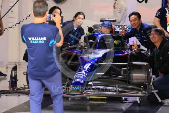 World © Octane Photographic Ltd. Formula 1 – Japanese Grand Prix - Suzuka Circuit, Japan. Sunday 9th October 2022. Pitlane. Williams Racing FW44 - Alex Albon and VIP guests with child in car.