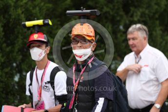 World © Octane Photographic Ltd. Formula 1 – Japanese Grand Prix - Suzuka Circuit, Japan. Sunday 9th October 2022. Paddock. Fans with car camera hats.