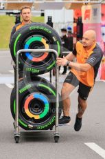 World © Octane Photographic Ltd. Formula 1 – Japanese Grand Prix - Suzuka Circuit, Japan. Thursday 6th October 2022. Arrivals. McLaren F1 Team mechanics with Pirelli intermediate tyres.