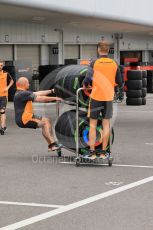 World © Octane Photographic Ltd. Formula 1 – Japanese Grand Prix - Suzuka Circuit, Japan. Thursday 6th October 2022. Arrivals. McLaren F1 Team mechanics with Pirelli intermediate tyres.