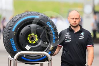World © Octane Photographic Ltd. Formula 1 – Japanese Grand Prix - Suzuka Circuit, Japan. Thursday 6th October 2022. Arrivals. Mercedes-AMG Petronas F1 Team mechanic with Pirelli wet tyres.