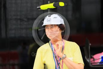 World © Octane Photographic Ltd. Formula 1 – Japanese Grand Prix - Suzuka Circuit, Japan. Thursday 6th October 2022. Paddock. Fan with Honda camera hat.