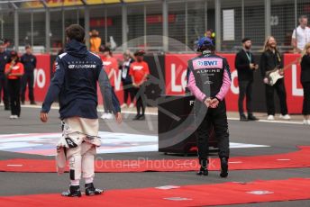 World © Octane Photographic Ltd. Formula 1 – British Grand Prix - Silverstone. Sunday 3rd July 2022. Grid. BWT Alpine F1 Team A522 - Fernando Alonso and Scuderia AlphaTauri AT03 - Pierre Gasly..