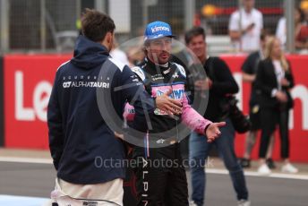World © Octane Photographic Ltd. Formula 1 – British Grand Prix - Silverstone. Sunday 3rd July 2022. Grid. BWT Alpine F1 Team A522 - Fernando Alonso and Scuderia AlphaTauri AT03 - Pierre Gasly..