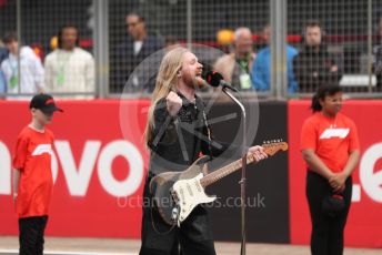 World © Octane Photographic Ltd. Formula 1 – British Grand Prix - Silverstone. Sunday 3rd July 2022. Grid. Sam Ryder (UK Eurovision 2022 entry) sings the national anthem.