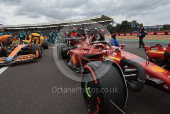 World © Octane Photographic Ltd. Formula 1 – British Grand Prix - Silverstone. Sunday 3rd July 2022. Grid. Scuderia Ferrari F1-75 - Charles Leclerc and McLaren F1 Team MCL36 - Lando Norris..