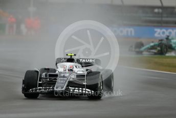 World © Octane Photographic Ltd. Formula 1 – British Grand Prix - Silverstone. Friday 1st July 2022. Practice 1. Scuderia AlphaTauri AT03 - Yuki Tsunoda and Aston Martin Aramco Cognizant F1 Team AMR22 - Lance Stroll.