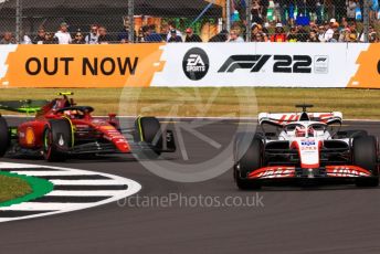 World © Octane Photographic Ltd. Formula 1 – British Grand Prix - Silverstone. Friday 1st July 2022. Practice 2. Haas F1 Team VF-22 - Kevin Magnussen and Scuderia Ferrari F1-75 - Carlos Sainz.