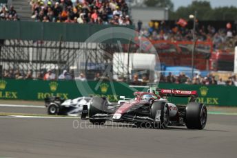 World © Octane Photographic Ltd. Formula 1 – British Grand Prix - Silverstone. Friday 1st July 2022. Practice 2. Alfa Romeo F1 Team Orlen C42 - Valtteri Bottas and Scuderia AlphaTauri AT03 - Yuki Tsunoda.