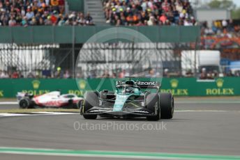 World © Octane Photographic Ltd. Formula 1 – British Grand Prix - Silverstone. Friday 1st July 2022. Practice 2. Aston Martin Aramco Cognizant F1 Team AMR22 - Lance Stroll and Haas F1 Team VF-22 - Kevin Magnussen.