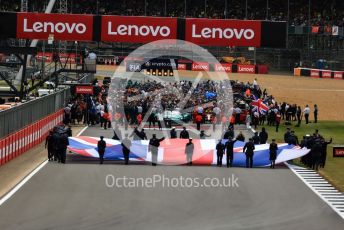 World © Octane Photographic Ltd. Formula 1 – British Grand Prix - Silverstone. Sunday 3rd July 2022. Race. Union flag unfurled in front of the grid.