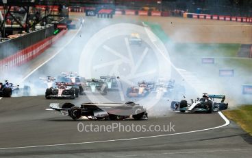 World © Octane Photographic Ltd. Formula 1 – British Grand Prix - Silverstone. Sunday 3rd July 2022. Race. Alfa Romeo F1 Team Orlen C42 - Guanyu Zhou and Mercedes-AMG Petronas F1 Team F1 W13 - George Russell after the collicion.