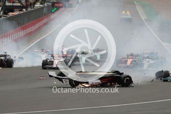 World © Octane Photographic Ltd. Formula 1 – British Grand Prix - Silverstone. Sunday 3rd July 2022. Race. Alfa Romeo F1 Team Orlen C42 - Guanyu Zhou slides inverted towards the gravel trap and barrier